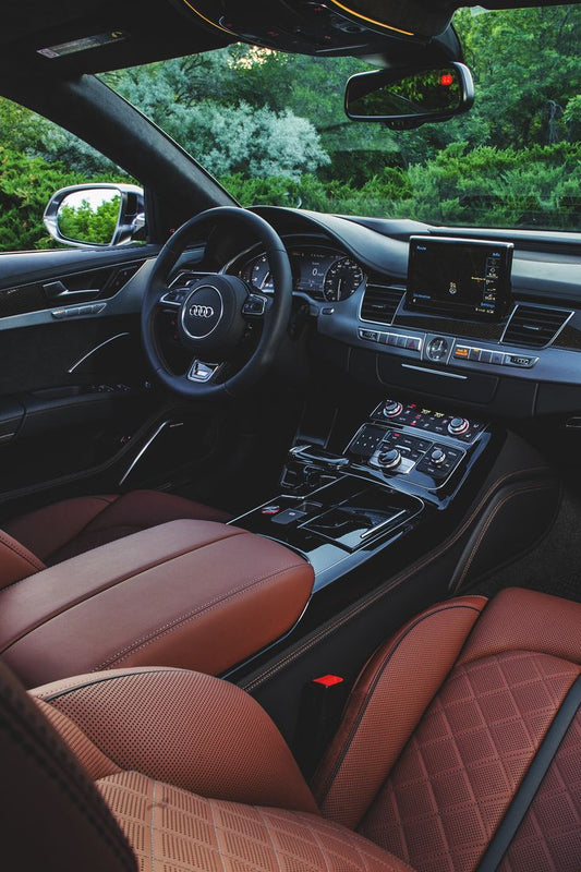 Latest Audi S8 luxury sedan interior with advanced navigation system and high-tech dashboard, perfect for technology enthusiasts and luxury vehicle owners.